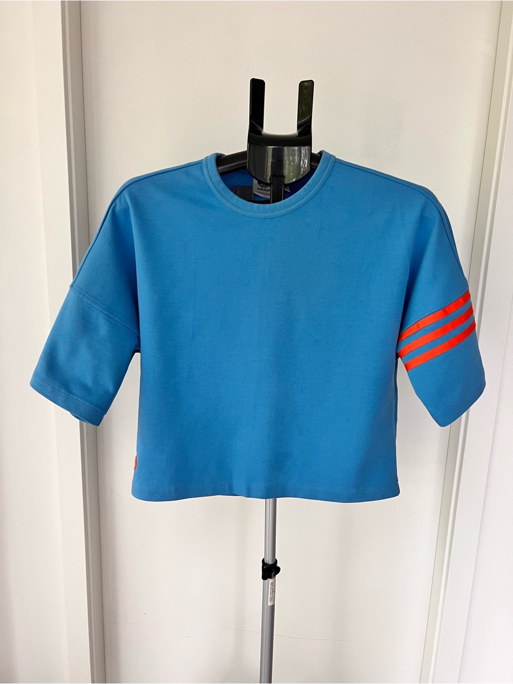 adidas Kids Blue Cropped Sweatshirt with Orange Sleeve Stripes